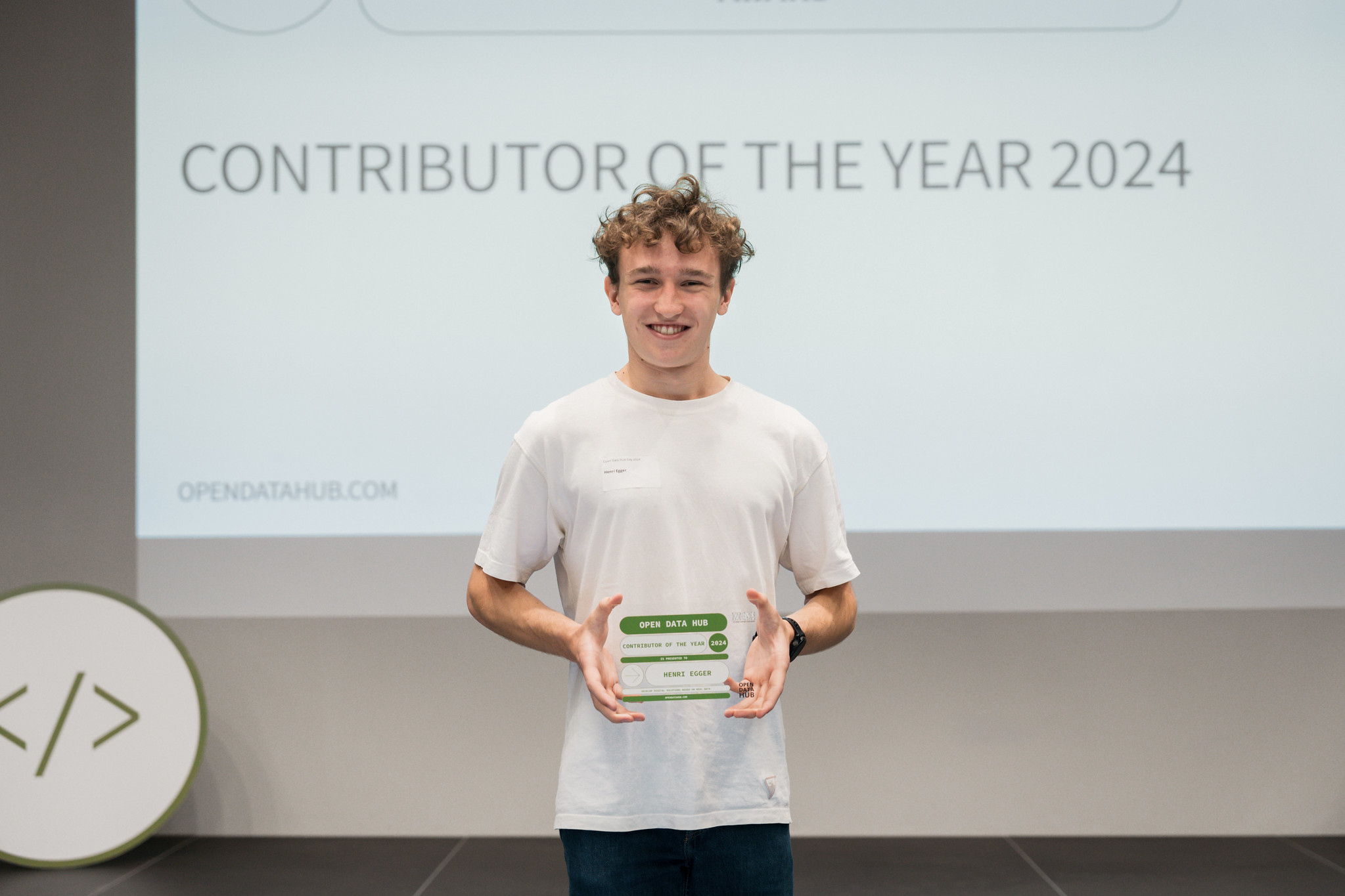 Portrait of Henri Egger, recognized as the Contributor of the Year by Open Data Hub.